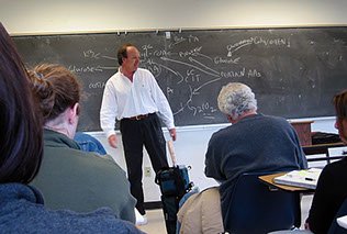 Dr. Ray Haring teaching Biological Sciences 170 at the blackboard, UC Davis